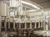 Máquina de lavar e tampar suco de paixão